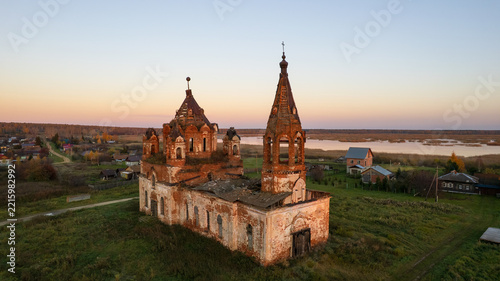 Abandoned 18th Century Church in Rural Village at Sunset