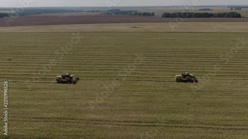 Rising retreat from harvesters in field, D-Log