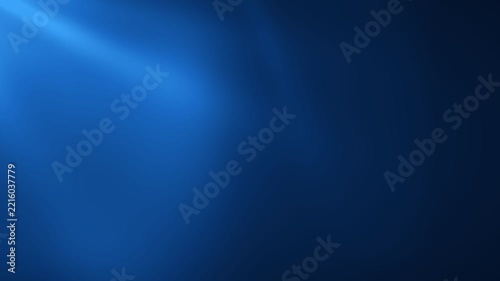 Deep sapphire volumetric waves undulating rhythmically in dark space light beams for technology branding