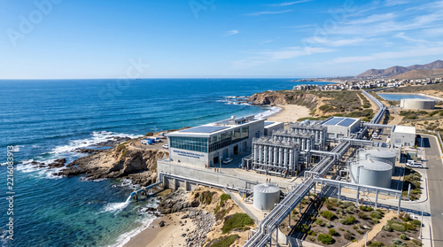 Aerial view of a coastal desalination plant processing seawater into fresh water