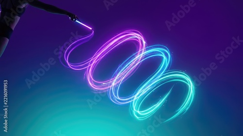 Woman's Hand Swirling Neon Light Whip, Creating Abstract Glowing Trails
