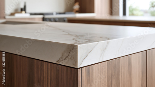 Thick stone countertop over a fluted wooden kitchen island