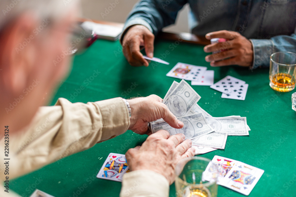 Fototapeta premium Card game with money stakes.