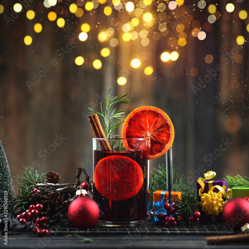Hot Mulled Wine with Orange Slice and Cinnamon in Festive Christmas Setting