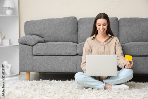 Online shopping and e-commerce, woman using laptop and credit card for secure...