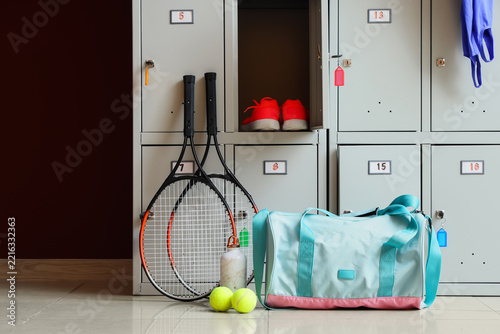 Fotografie Fitness and active lifestyle, tennis gear with rackets and sports bag in a gym l