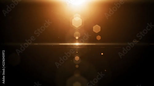 Warm sun light lens flare effect with golden bokeh particles for cinematic overlay.