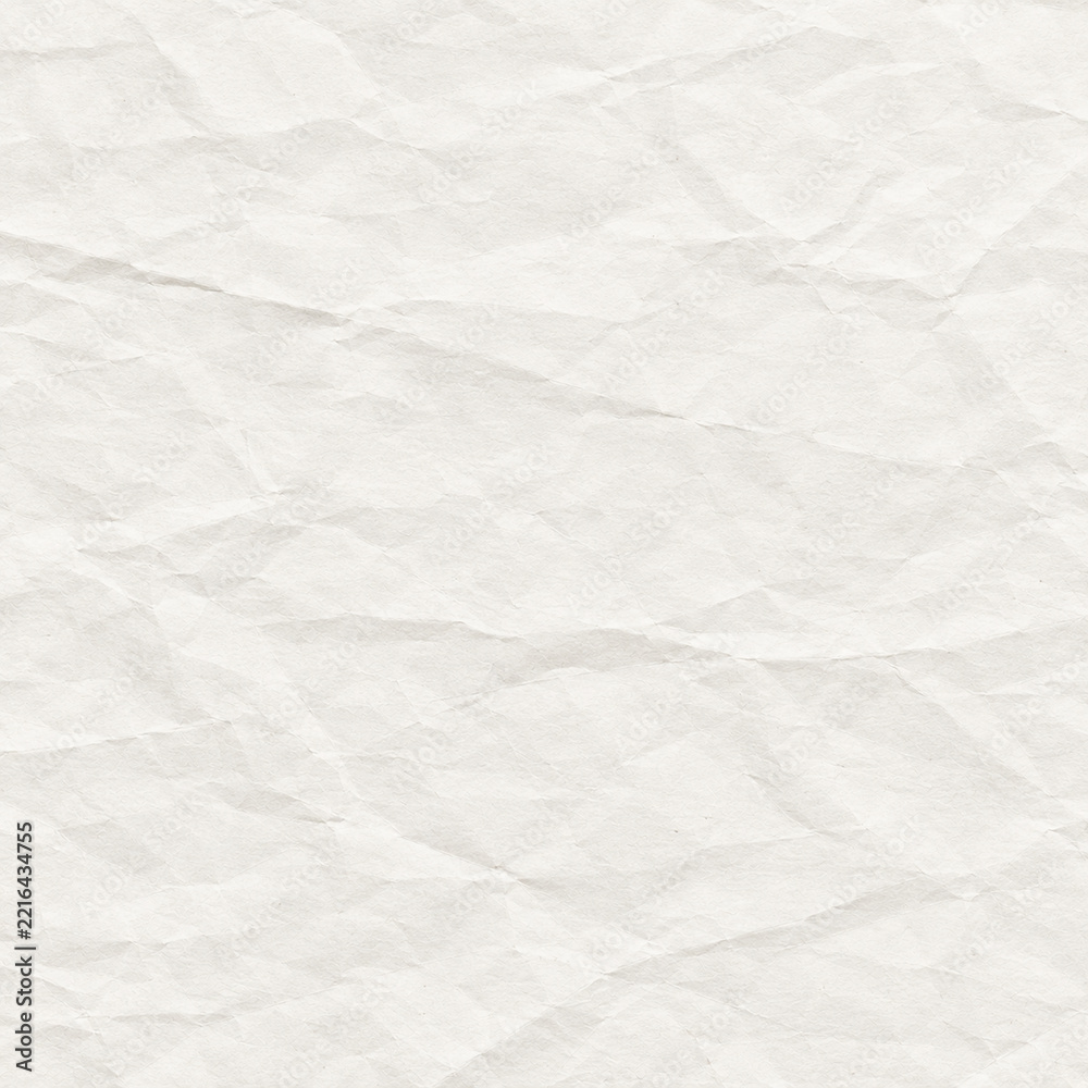 Fototapeta premium White crumpled paper texture background with soft wrinkles and folds