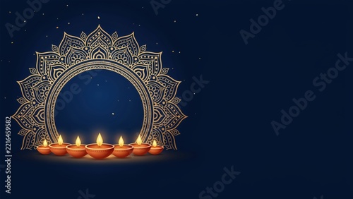 Traditional lit clay diyas positioned beneath an ornate golden mandala during Diwali