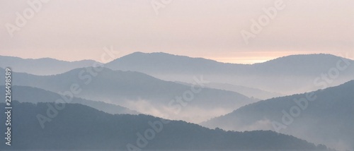 Misty Blue Mountain Ranges at Sunrise