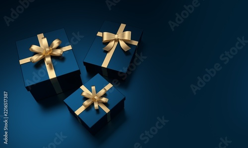 Blue gift boxes with golden ribbons celebrating holidays
