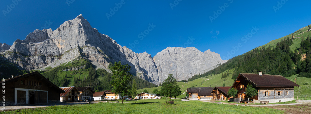 Naklejka premium The morning panorama of north walls of Karwendel mountains - walls of Spritzkarspitze and Grubenkarspitze from Enger tall in the Grosser Ahornboden walley.