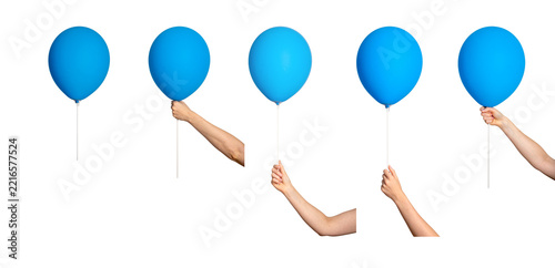Set of blue balloons, several held by hand and arm, isolated on white background. Outstretched fingers grip string, holding each balloon with a steady palm. Great for birthday and party designs.