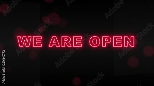Close up of a person opening a metal door handle to enter a bright
