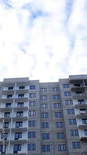 Construction of an apartment building using precast concrete slabs and reinforced concrete structures vertical. Construction site of an apartment building. Housing construction