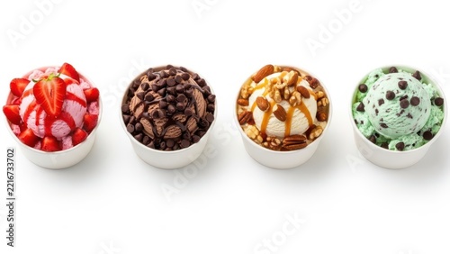 Four colorful truffle balls with toppings