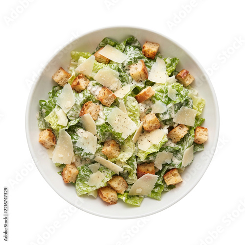 Delicious caesar salad with crisp romaine lettuce crunchy croutons and grated parmesan cheese served on transparent background