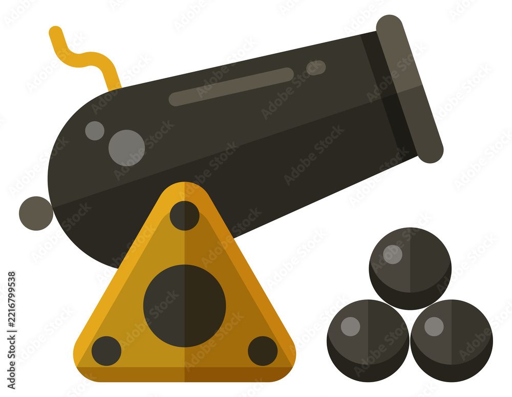 Fototapeta premium A black cannon is next to a yellow triangle