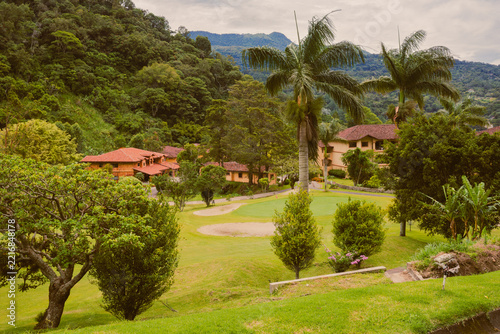 Homes in Valle Escondido, Boquete, Panama, viewed from golf course on a cloudy day.