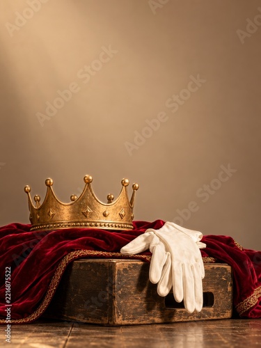 Golden Prop Crown and White Gloves on a Red Velvet Cape with Copy Space