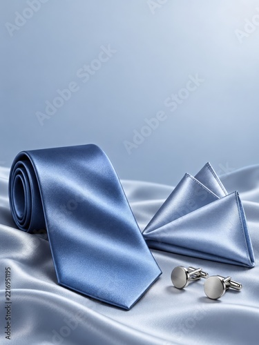 Blue Silk Tie with Pocket Square and Silver Cufflinks on Satin