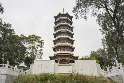 Multi-Tiered Chinese Pagoda Tower Surrounded by Trees in Guangxi, China