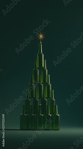 A creatively arranged Christmas tree made of green glass bottles, topped with a glowing star, against a dark, minimalist background