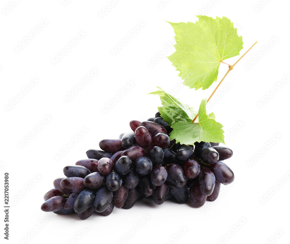 Fototapeta premium Bunch of fresh ripe grapes with green leaves isolated on white