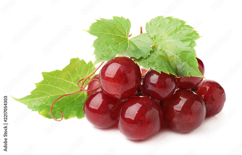 Fototapeta premium Fresh ripe grapes and green leaves isolated on white