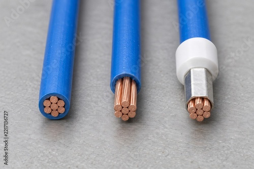 Three preparation stages of stranded wire with a crimped ferrule