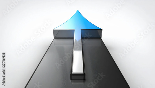Modern black arrow sculpture with blue gradient tip on reflective surface, creating bold upward direction symbol against clean white background