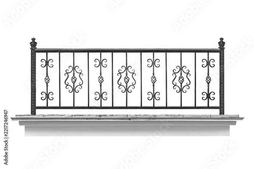 Elegant balcony railing with wrought-iron elements.  B.