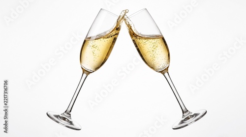 Two champagne glasses clinking together, set against a white background.