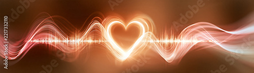 Glowing heart shape integrated with a dynamic waveform, radiating warm light on a blurred brownish background.