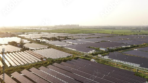 Aerial view of solar panel arrays in rural fields