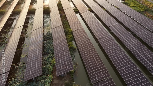 aerial view of floating solar power station on water surface