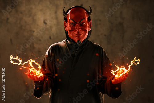 Red devil with horns with magic spell, Halloween theme
