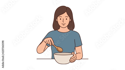 Woman holding a white bowl and stirring food with a wooden spoon at the dining table.