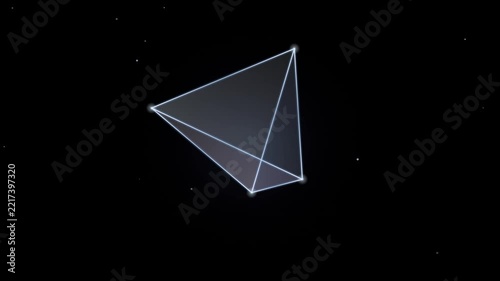 Prismatic glass monolith rotating slowly with luminous transparent facets