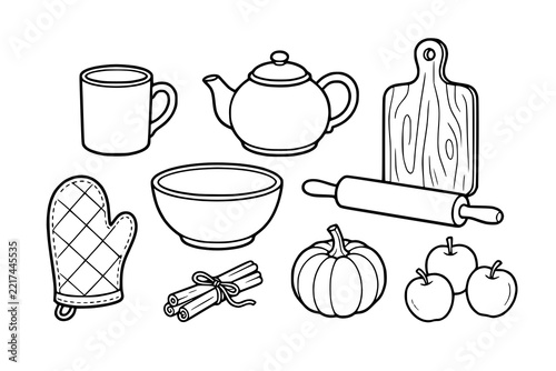 Kitchen utensils and autumn harvest elements feature teapot cutting board rolling pin and apples.