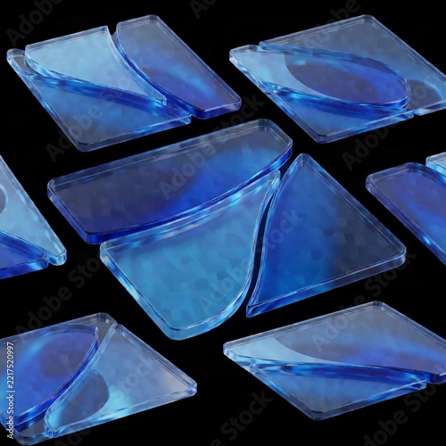 Close-up of translucent blue glass shards on a black background
