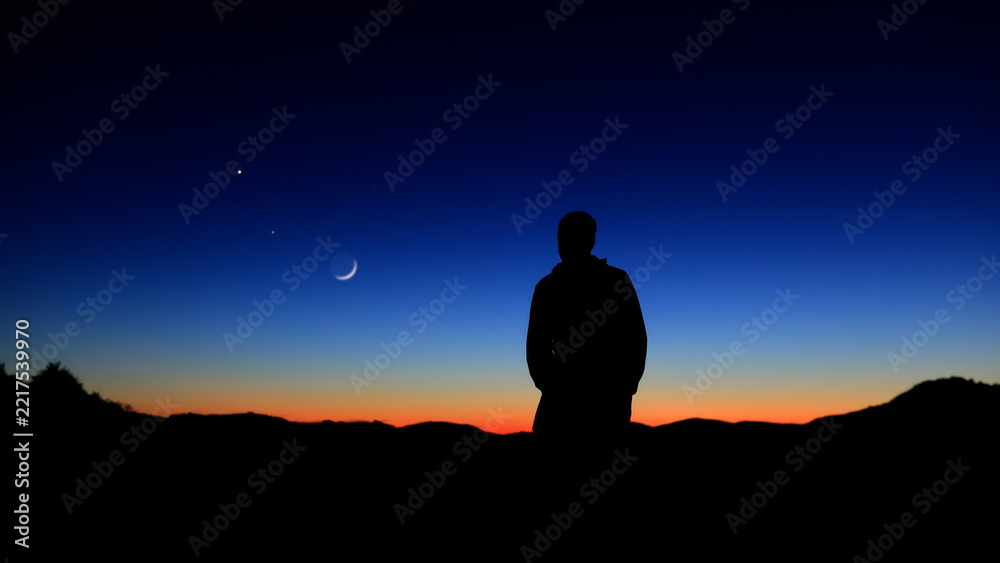 Fototapeta premium Amateur astronomer observing stars, planets and other celestial objects.