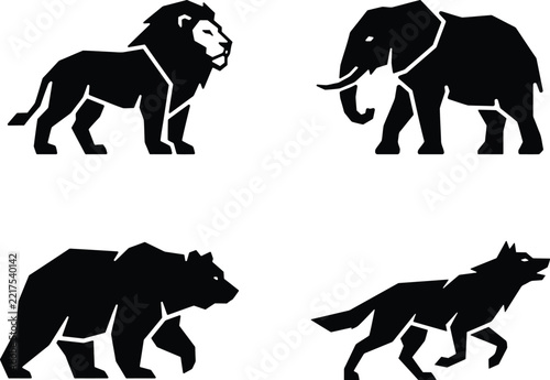 Set of four black silhouette icons featuring a majestic lion an elephant a grizzly bear and a wild wolf