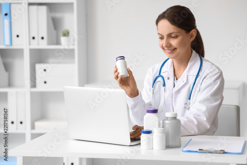 Telemedicine and prescription medication, doctor consulting patient on laptop...