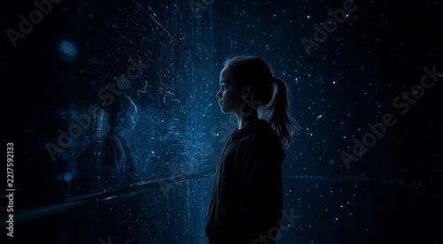 Silhouette of a young girl in dark blue moody atmosphere with reflections