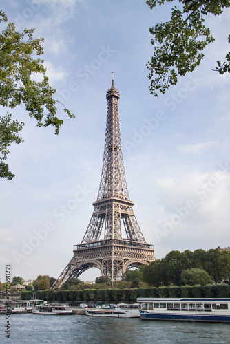 Eiffel Tower and blue sky, Paris, France. View of Seine river in summer.