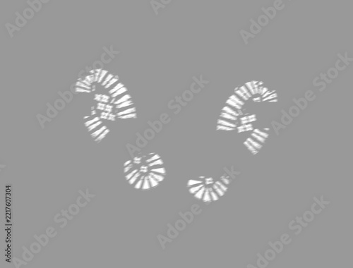 Soft shadow vignette of circular shoe prints with transparent center cutout 