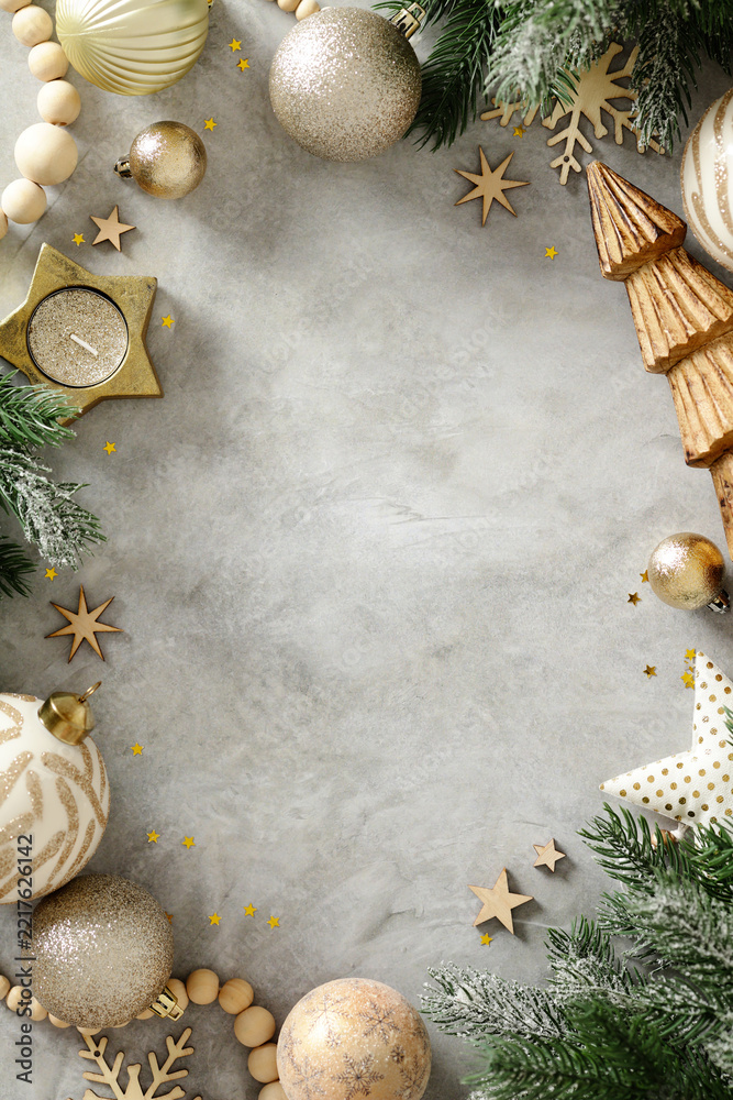 Fototapeta premium Scandinavian Christmas decoration frame with gold baubles and fir