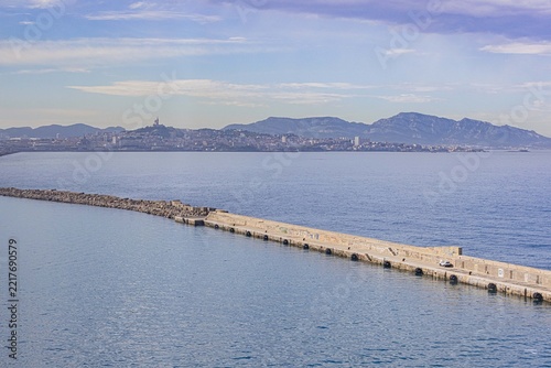FRANCE-MARSEILLE-BREAKWATER-SEA AND DISTANT SKYLINE