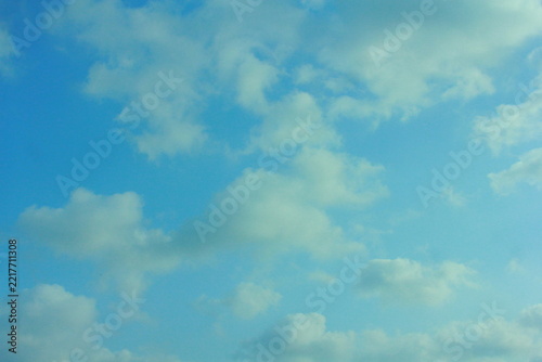 Fotografie Blue sky background with soft white clouds, peaceful atmosphere nature view, bri